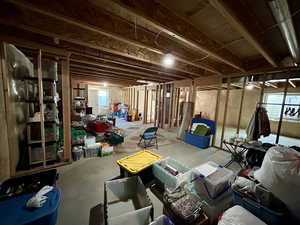 Basement featuring plenty of natural light