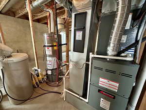 Utility room with strapped water heater