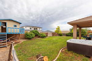 Jacuzzi and Playhouse in a beautiful private, fenced backyard