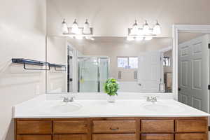 Bathroom featuring double vanity,