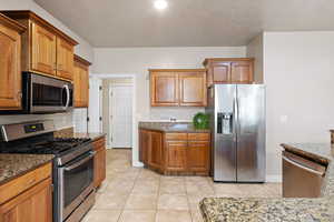 Stainless Steel appliances, Stone countertops