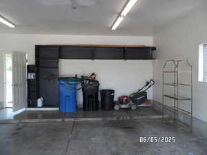 View of garage with built-in shelves