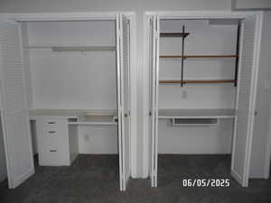 View of closets with built-in desks