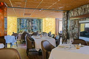 Dining space featuring hardwood / wood-style flooring