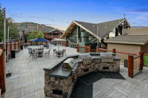 View of patio / terrace with outdoor dining area and a gazebo