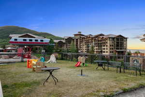 Community playground with a mountain view