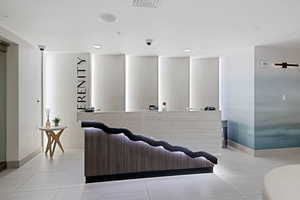 Reception area featuring recessed lighting and a surveillance system