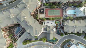 Aerial view of property's location featuring a pool area