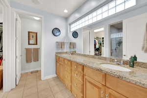 Primary bathroom with dual sinks.