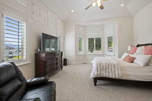 Carpeted bedroom featuring recessed lighting, ceiling fan, and baseboards