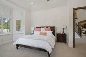 Carpeted bedroom with baseboards
