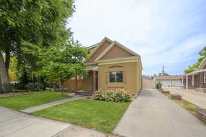 View of front of home with stucco siding