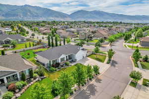 Aerial perspective of suburban area with a mountain backdrop
