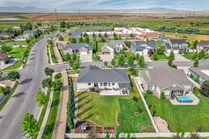 Aerial view of residential area featuring mountains