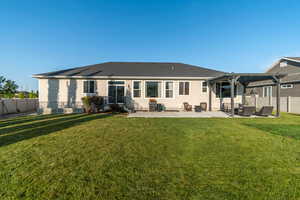 Rear view of house with a pergola, a patio, an outdoor living space, and roof with shingles