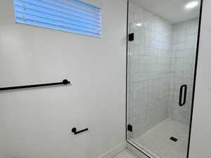 Bathroom with a stall shower