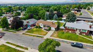 Aerial perspective of suburban area with a mountain backdrop