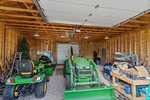 Garage featuring a garage door opener