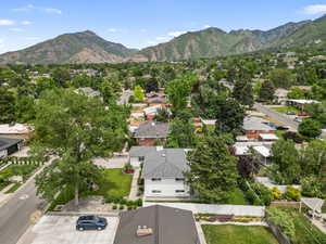 Aerial perspective of suburban area with a mountain backdrop