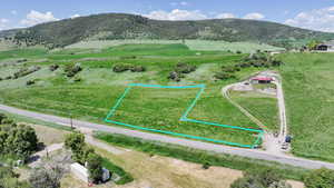View of mountain backdrop featuring rural landscape- boundary line in picture is for visual/estimate only