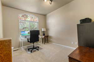 Office area with carpet and baseboards