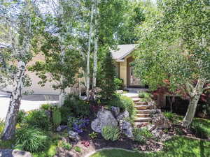 View of yard featuring french doors