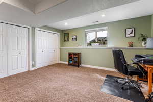 Bedroom #4 located in basement with 2 above ground windows.