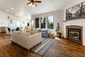 Family room with new Anderson windows and REAL WOOD flooring!