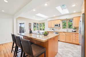 Skylights, Granite Countertops, tons of natural light