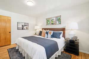 Bedroom with wood finished floors