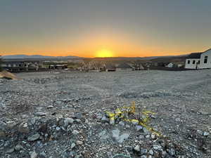 GLORIOUS SUNSETSElevated lot offers breathtaking sunsets over St. George's red rock ridges; adds beauty to your evening gatherings around your patio and  pool deck.