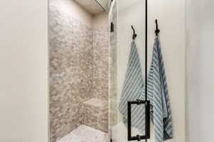 Bathroom with a tile shower