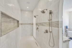 Bathroom with a tile shower