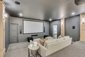 Cinema with carpet and recessed lighting