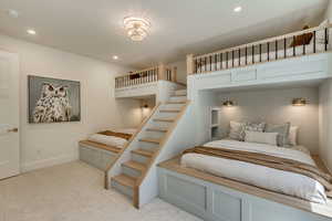 Bedroom featuring light carpet and recessed lighting