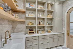 Storage area featuring a sink