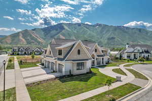 View of mountain backdrop with nearby suburban area