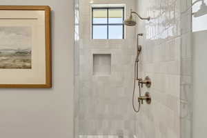 Bathroom with tiled shower