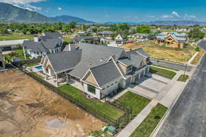 Aerial view of residential area featuring a mountain backdrop