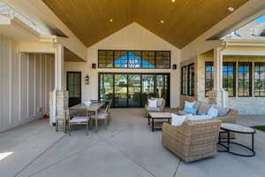View of patio featuring an outdoor living space and outdoor dining space