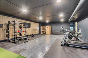 Exercise area featuring baseboards
