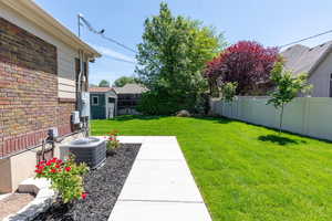 View of yard with central air condition unit