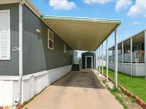 View of car parking with a carport