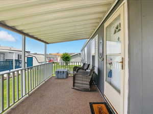 Balcony featuring a residential view