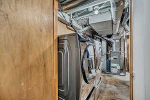 Washroom with washer / dryer and heating unit