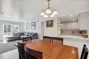 Open concept living, dining and kitchen area.