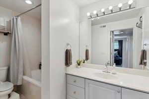 Large bathroom with double heads in shower.