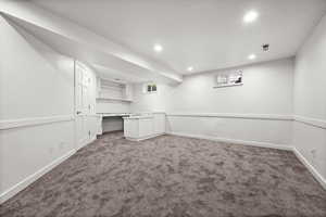 Below grade area featuring carpet, recessed lighting, and baseboards
