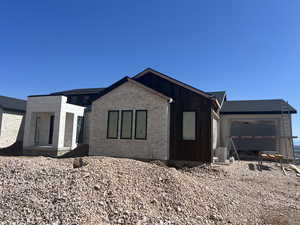View of front of home with a garage