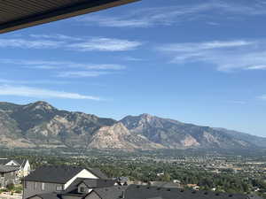 View of mountain backdrop with nearby suburban area